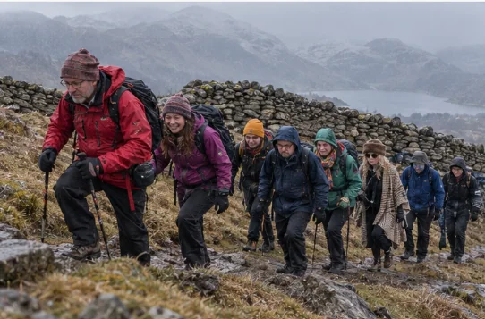 Participants walking towards Grey Crag Summit during the Keldale Weekend